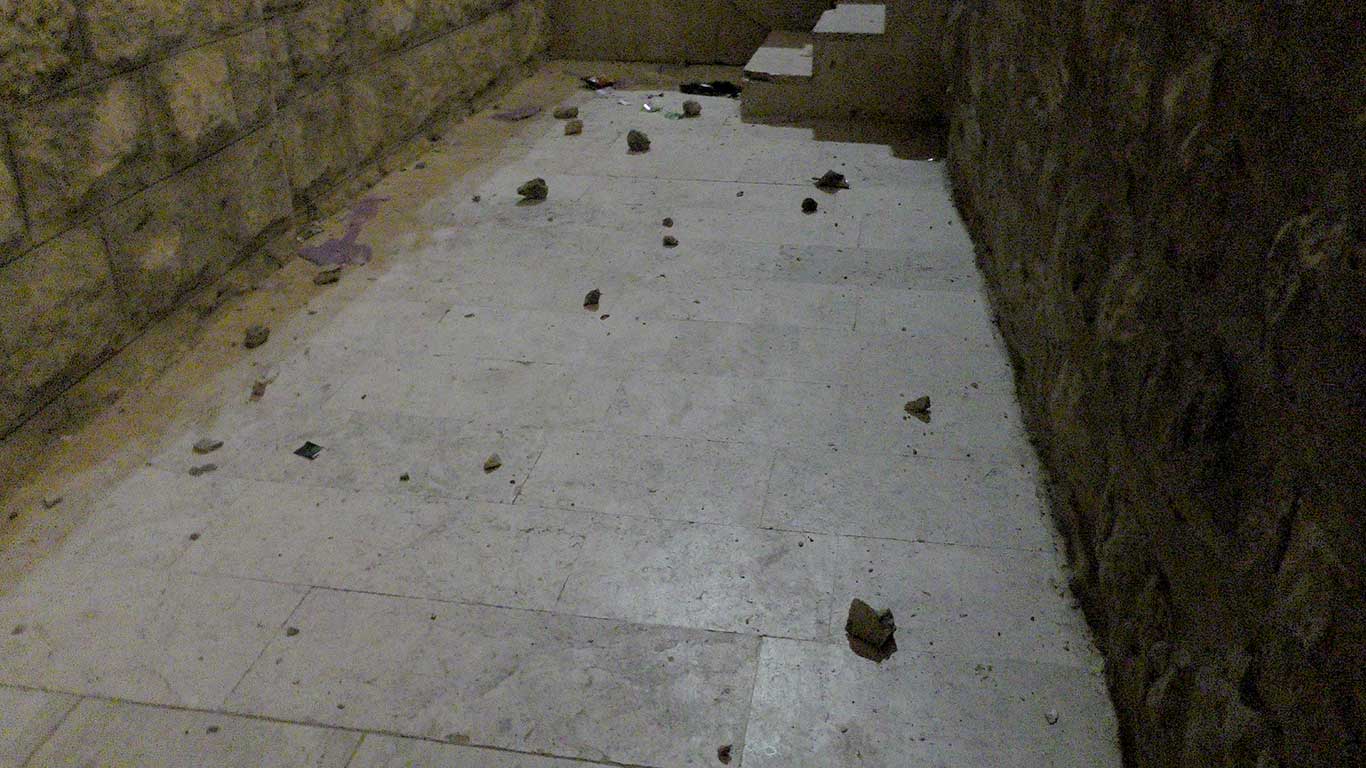 Stones thrown by settlers into the family's yard. Photo by Manal al-Ja’bari, B'Tselem, 11 August 2021