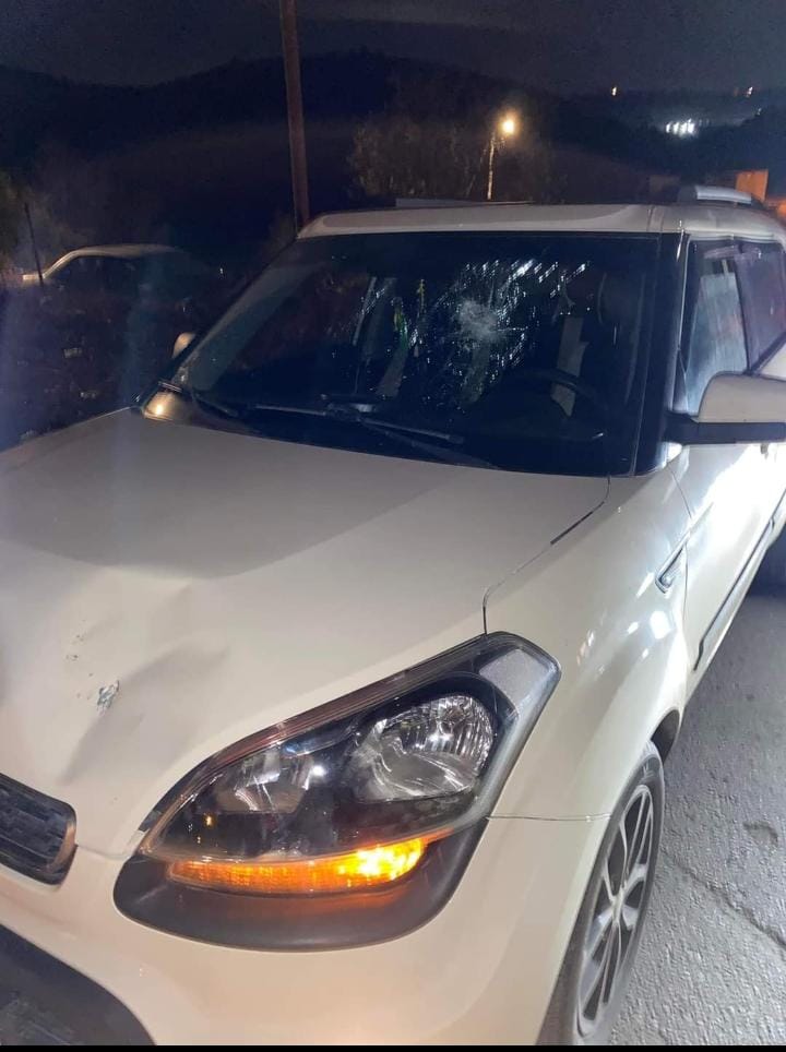 The car attacked by the settlers. 