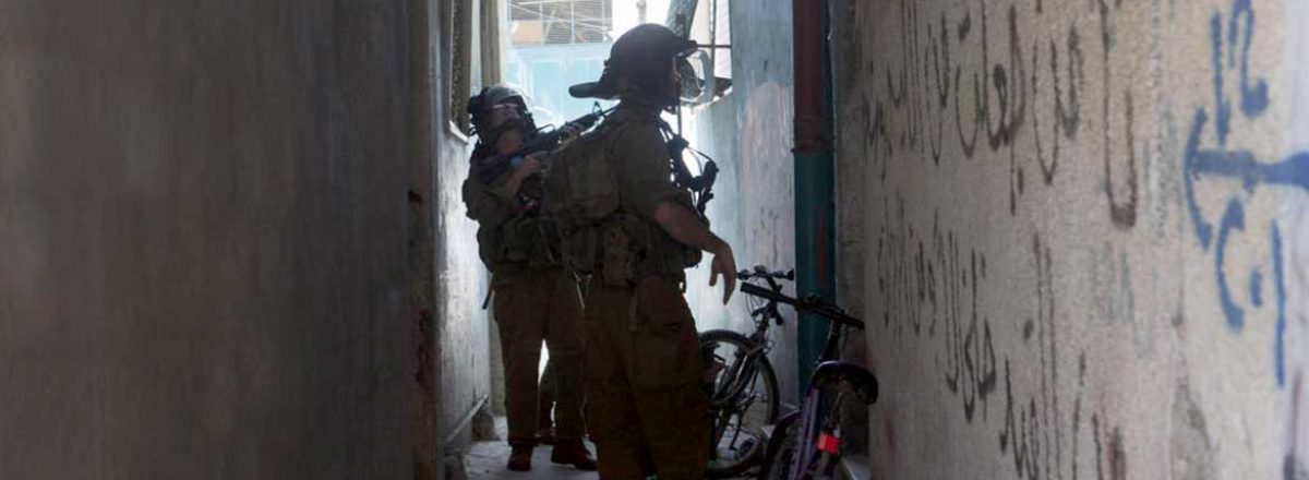  Israeli soldiers during a raid on al-‘Arrub R.C., Hebron District. Photo by Anne Paq, Activestills, 24 May 2013