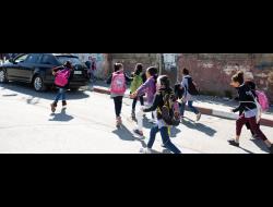 Girls on their way to school in the Jalazun refugee camp. Photo by B'Tselem, 21.2.18