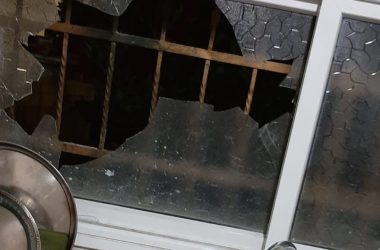 Broken window in the Hamed's family home. Photo courtesy of family