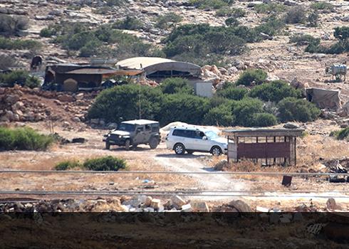 Military and Civil Administration vehicles in the family’s residential compound. Photo: ‘Aref Dagharmeh, B'Tselem, 7 August 2018