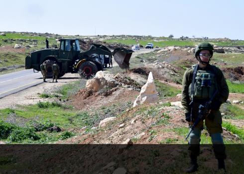 Military bulldozer blocking off a road in the South Hebron Hills. Photo by Nasser Nawaj’ah, B’Tselem, 11 March 2019