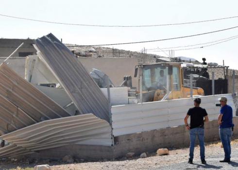 Demolition of caravan in Um al-Kheir. Photo by Nasser Nawaj'ah, B'Tselem, 12 June 2019