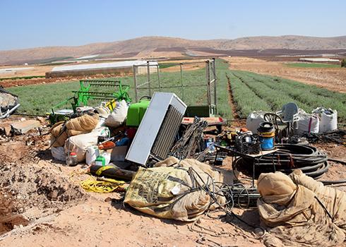 Farming equipment left in a field in ‘Atuf after the demolition. Photo by ‘Aref Daraghmeh, B’Tselem 18 Sep. 2019
