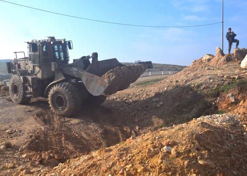 Army bulldozer blocking the road to She'b al-Batem. Photo by Nasser Nawajah, B'Tselem, 23 February 2020