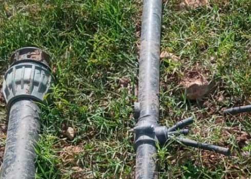 Pipes cut by the settlers in the cucumber field. Photo courtesy of landowner 