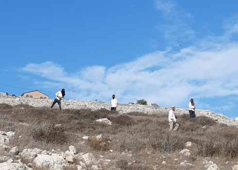 Settlers attacking the ‘Eid family’s home. Photo courtesy of the family