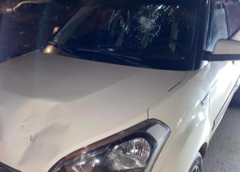 The car attacked by the settlers. 
