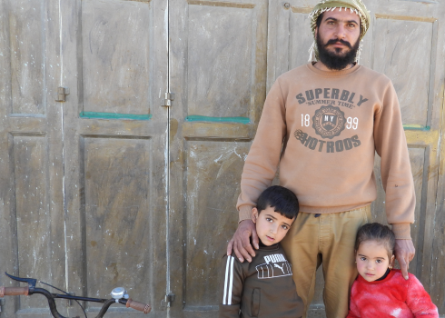 'Abiddalah ‘Abayat with the children. Photo: Manal al-Ja’bari, B’Tselem, 13 Feb. 2022 