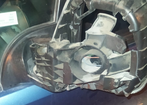 The broken side-view mirror in Mustafa’s car. Photo courtesy of the owner