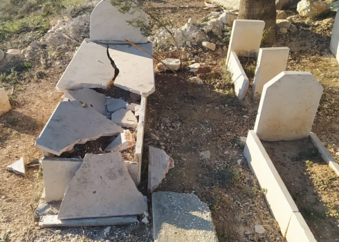 Tombstones defaced by the settlers in the Beita cemetery. Photo courtesy of town residents  