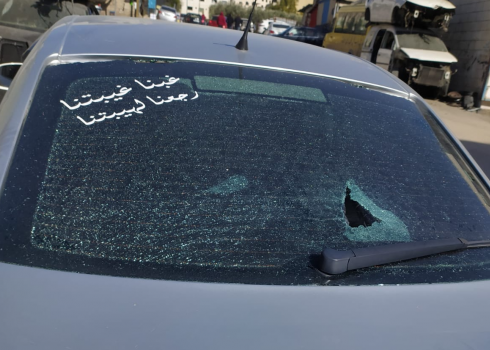 The smashed back window of Dmeidi’s car. Photo courtesy of the owner