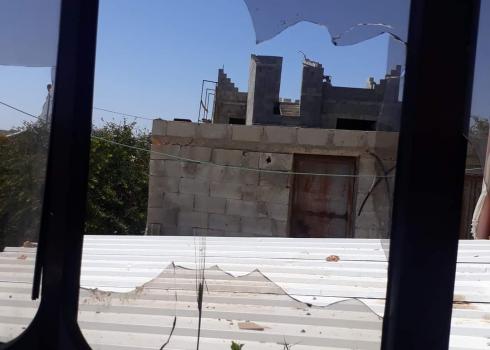 One of the windows shattered by the settlers. Photo courtesy of Abu Raydah  