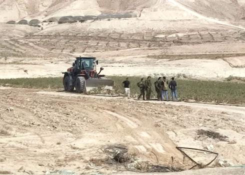 Civil Administration bulldozer razing crops in al-‘Auja. Photo: ‘Aref Daraghmeh, B’Tselem, 21 May 2023 