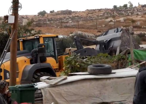 The demolition of the tent in Khirbet a-Rakeez. Photo courtesy of residents