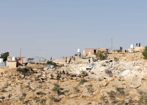 Settlers raiding the village of Khilet a-Dabe’ with their flock. Photo: Omri Eran-Vardi, ActiveStills, 31 May 2025 