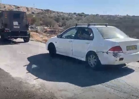 The soldiers leaving M.T.’s land in the military vehicle and his car. Taken from a video, courtesy of M.T.
