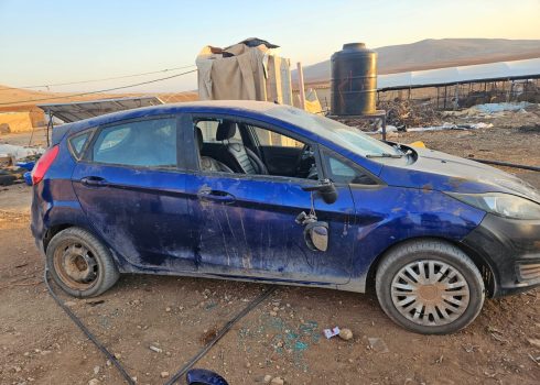 A car with a window smashed by settlers. Photo courtesy of local residents