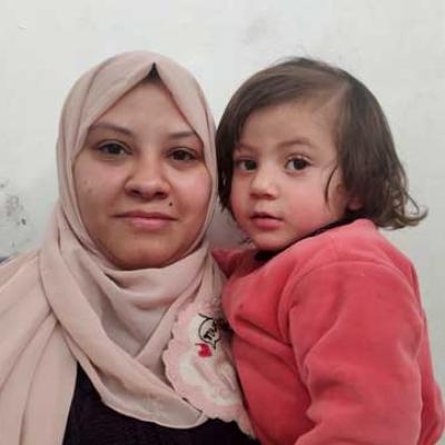 Iman al-Jamal with daughter Zinat. Photo by Olfat al-Kurd,3 March 2023.