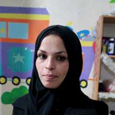Khitam al-Hamami at the daycare center where she works. Photo: Olfat al-Kurd, B'Tselem, 16 Feb. 2023 