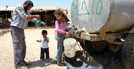 Palestinian residents of Khirbet a-Duqaiqah, South Hebron Hills, 19 August 2012. Photo: Nasser Nawaj'ah, B'Tselem. 