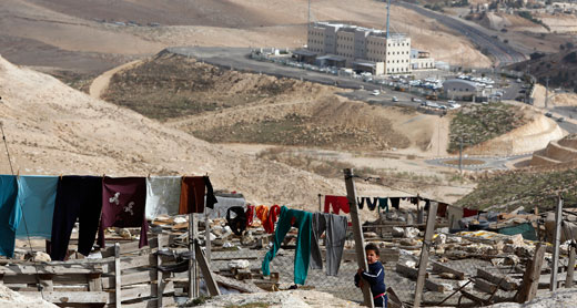 Encampment of Jahalin Bedouins. (Background: Police station in E1). Photo: 'Ammar 'Awad, Reuters, 6 December 2012.